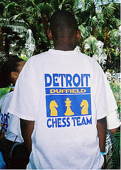 Duffield player checking out the fish pond at the hotel. For many of these players, it was their first trip to a chess tournament.