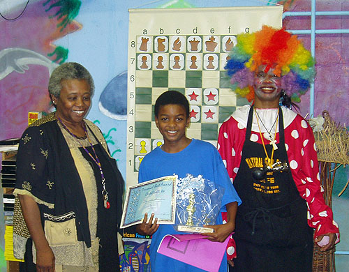 Colette McGruder (left) with prize winner at chess festival.