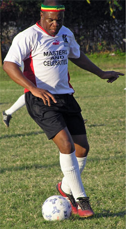 Ian Wilkinson  flashed his dribbling skills while helping his team to a 2-1 victory. Photo by Bertram Scott.