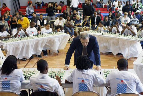 Kasparov at Harlem simultaneous exhibition. Photo by Harlem Children's Zone.