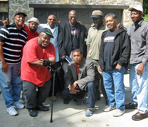 L-R: Nigel Mitchell, Larry Saxby, Lamont 'Malik' Rogers, Glenn Bady, Robert Gist, Bruce Thompson Jonathan Phillips, Ray 'Dragon' Robinson (front) and Akeem Thompson (kneeling)