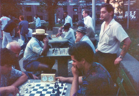 Russian Paul waiting for a game while Ernest Colding (seated right) is in a test.