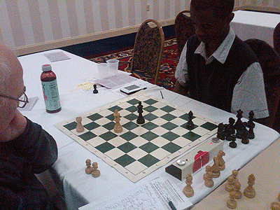 IM Ilye Figler trying to hold the rook versus bishop ending. Photo by Glenn Bady.