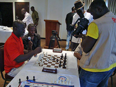 Francis Anquandah showing game to e.tv Ghana.