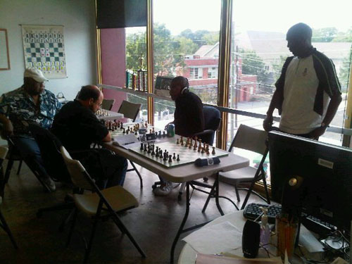 Daaim Shabazz (right) watching the action.  Photo by Frank Johnson.