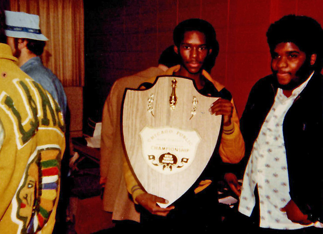 Me holding the plaque for the 1980 H.S. Chess Championship.