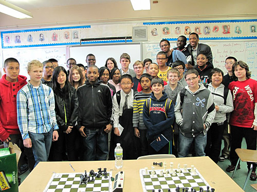 Magnus Carlsen (back) with National Champions, IS-318. Photo by Elizabeth Spiegel.