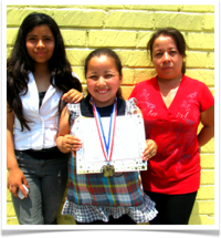 2nd Place Winner Christian David with family.