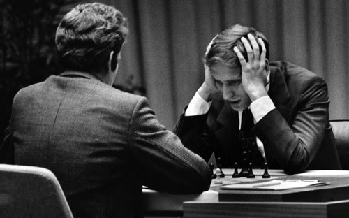 Bobby Fischer (right) on the move against Boris Spassky in their pivotal 1972 match in Reykjavik, Iceland.