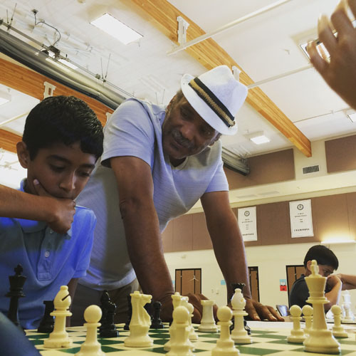 Emory Tate shares the joys of chess with his students at the 
Chris Torres Chess Camp in Fremont, California.
Photo by Chris Torres