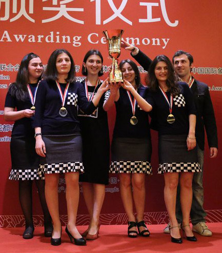 Mariya and sister Anna after advancing to the final.