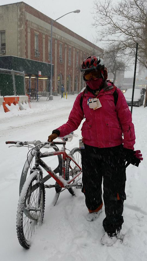 Adia Onyango cycling in snow.