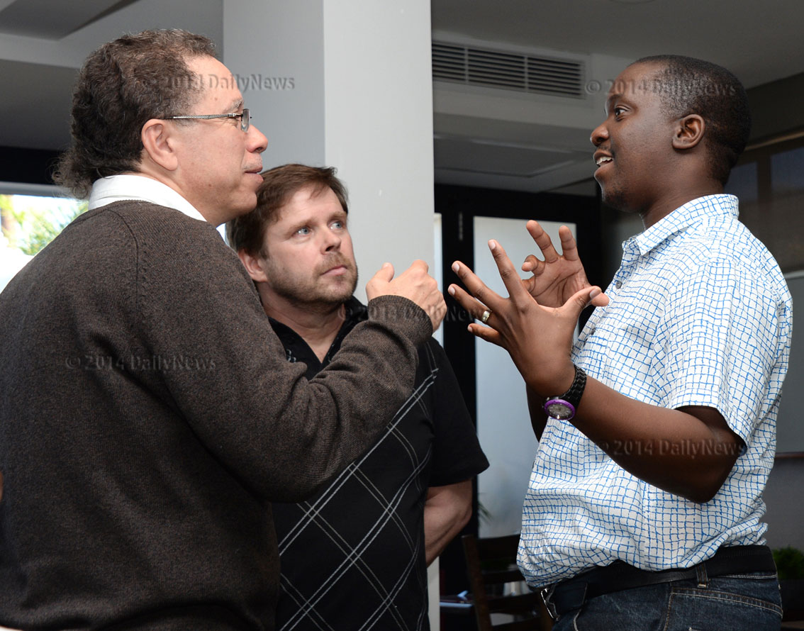 As the President of Zone 4.3 in 2014, Sitale is seen here speaking with Barbados' Allan Herbert of FIDE Development Commission about the challenges of chess development in Africa. Lack of funding and development structures still hamper the chess outreach. Photo by Tebagano Ntshole/Daily News