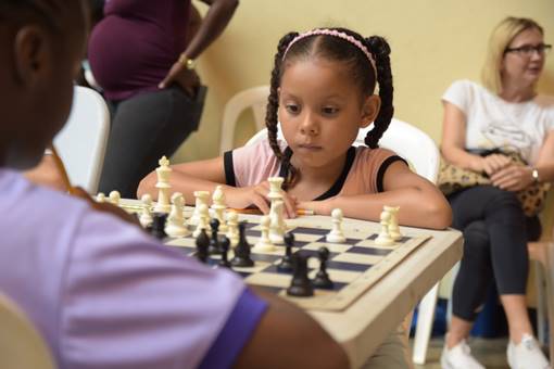 Under 10 Female Champion Victoria Salazar from Hillel Academy is in a pensive mode