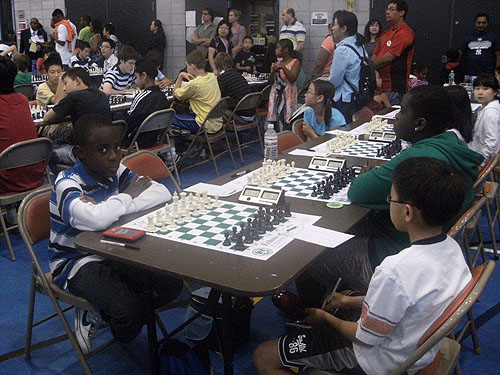 Joshua Colas about to pawn off against opponent. Photo by Guy Colas.