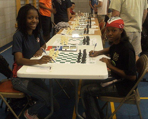 Darrian Robinson (USA) vs. Wislandie Desrosiers (Haiti). Photo by Guy Colas.