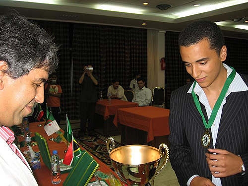 
Bassem Amin receiving his championship award.