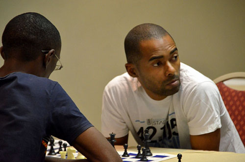 Kenny Solomon (right) emerged as the continental champion yet is still seeking conferral of GM title. Photo by Namibian Chess Federation.