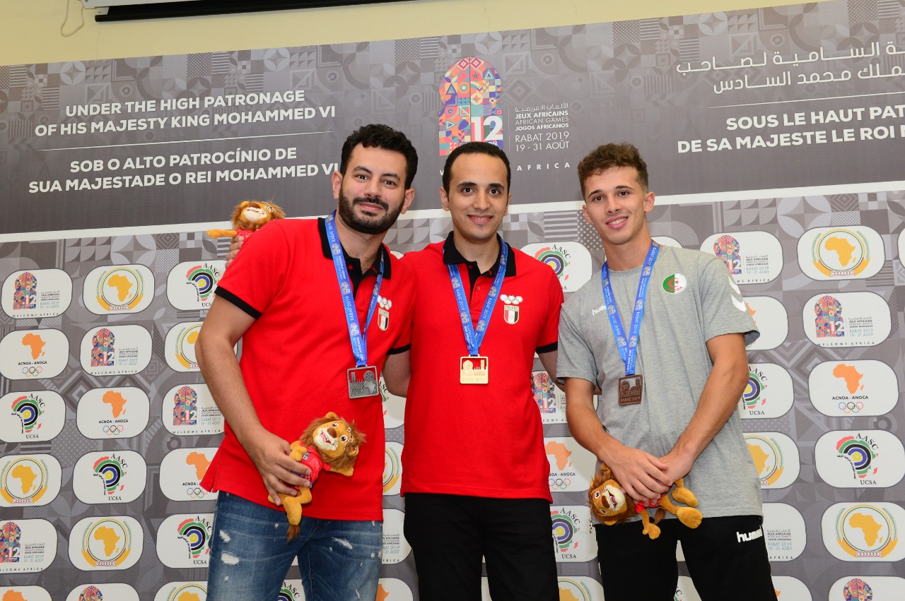 Ahmed Adly (Egypt), Bassem Amin (Egypt), Bilel Bellahcene (Algeria) at 2019 Africa Games taking 1-2-3 in the blitz competition. Photo by Mohamed Bounaji.