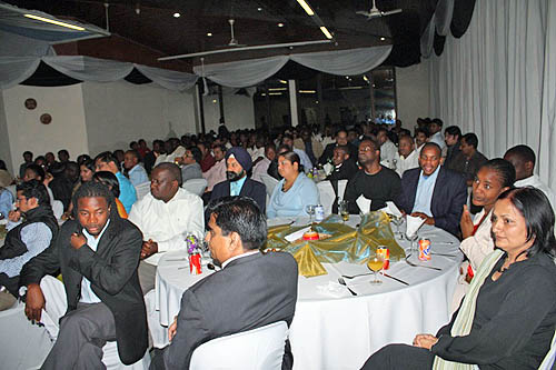 Audience at dinner awaiting Anand speech.