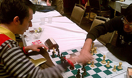 Aleksandr Lenderman analyzing with Pentala Harikrishna. Harikrishna won.