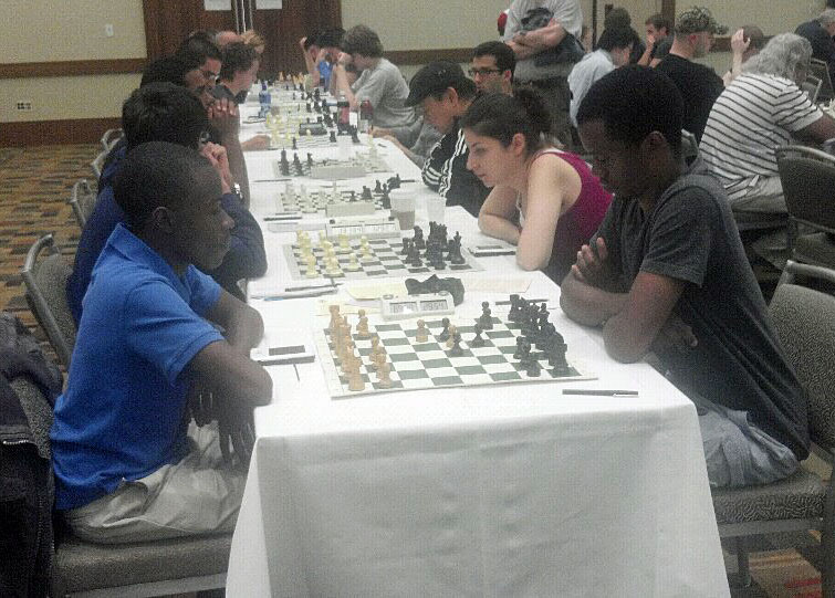 NM Josh Colas vs. Farai Mandizha. Photo by Guy Colas.