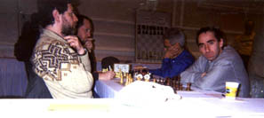 GM Gregory Kaidanov vs. GM Alexander Goldin; GM Iyla Smirin vs. GM Idlan Ibragimov. Copyright © Daaim Shabazz, 2002.