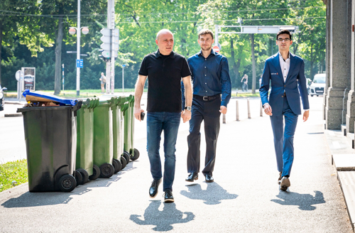 Sergey Karjakin and Anish Giri walking with Giri's trainer Vladimir Chuchelov