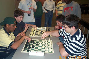 Bughouse Madness! Kazim Gulamali & William Stewart vs. Richard Francisco & Carlos Perdomo . Copyright Â© 2003, Daaim Shabazz