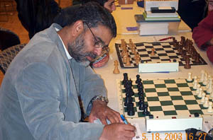 Yusef Mumtaz (father of 15-year old Kazim Gulamali). Copyright Â© 2003, Daaim Shabazz