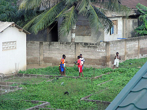 After I checked in, I saw children playing in back of the hotel.