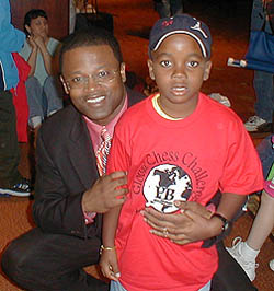 Ronnie posing with GM Maurice Ashley at the HB scholastic tournament (Photo by Lesley-ann Nelson)