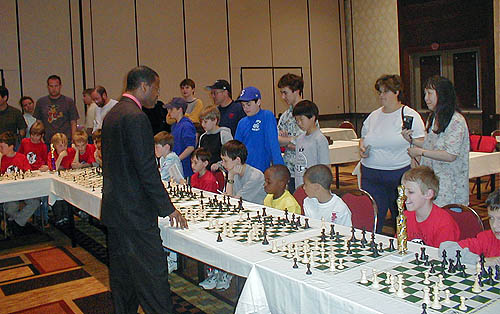 Ronnie playing in a simul against GM Maurice Ashley (Photo by Lesley-ann Nelson)