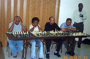 AJamaican Womens Champion Deborah Richards (2nd from left) asked about Black female playersquite a common question. Richards has been scoring well in Jamaican mens events.