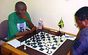 Amons 'last stand' against Douglas. Copyright  2004, Jamaican Chess Federation.