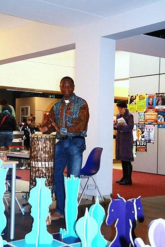 An African drummer in the Netherlands gives blessings to the match.