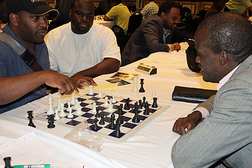 Jones Murphy (right) analyzing his game with Aderemi 'Remi' Adekola. This was the sixth win in a row for Remi who Jones called “talented”. Remi would come in 2nd overall in the under-2000 with 6.5/7 and then go on to playoffs to take 2nd. He won $20,000. Jones came in 5th.