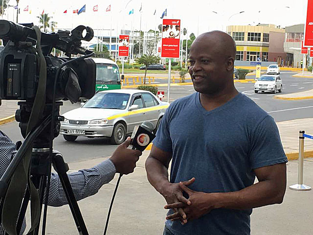 Maurice is interviews upon arrival in Nairobi.