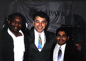 Jomo Pitterson, GM Yasser Seirawan, Shane Matthews in 'The Tent.' Copyright  Ian Wilkinson, 2002.