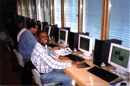 Ian Wilkinson in the Olympiad Press Center. Copyright  Ian Wilkinson, 2002.