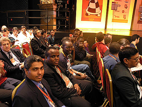 Jamaicas Shane Matthews and Duane Rowe sitting next to the Ugandans.