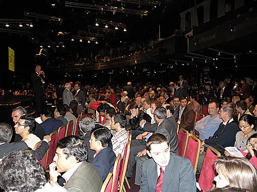 The Olympiad crowd in anticipation of ceremonies. Viswanathan Anand is caught in the lower left.