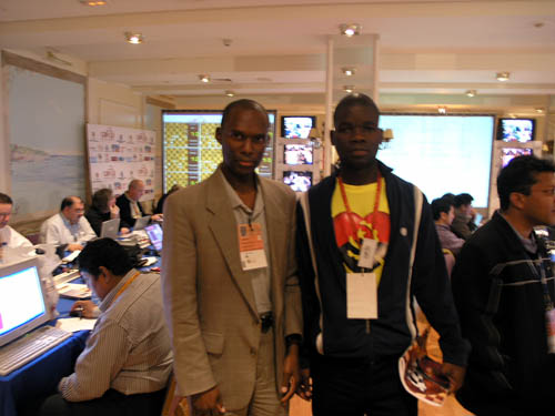 Daaim Shabazz and Angola's Catarino Domingos in the press room.