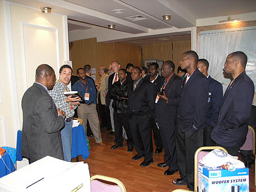 Barbados delegate Allan Herbert praises Ians Wilkinsons magnanimous effort while players from Jamaica and Barbados look on. Presidents of Uganda and South Africa received complimentary copies in care of Jerry Bibuld. The Chief Arbiter of the Bled Olympiad Geurt Gijssen and FIDE official Boris Kutin were also present at the unveiling and received complimentary copies.