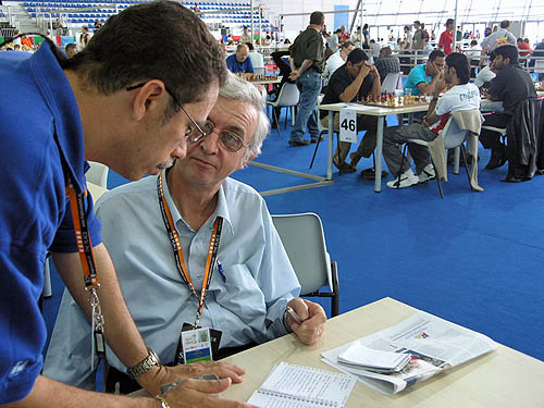 Allen Herbert of Barbados conferring with Wheeler at the 2006 Chess Olympiad in Turin, Italy. Photo by Daaim Shabazz.