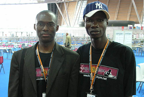 The Chess Drum’s Daaim Shabazz with Nigeria's Bunmi Olape. Copyright © 2006, Daaim Shabazz.