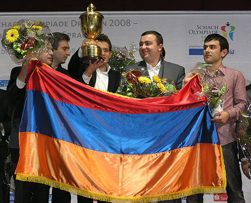 Armenia men rejoicing over 2nd consecutive Olympiad gold.