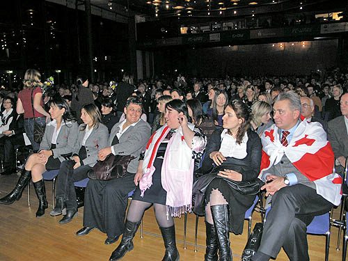 Georgia's winning team with team captain drapped in Georgia flag. The country has overcome political challenges this year. Photo by Daaim Shabazz.