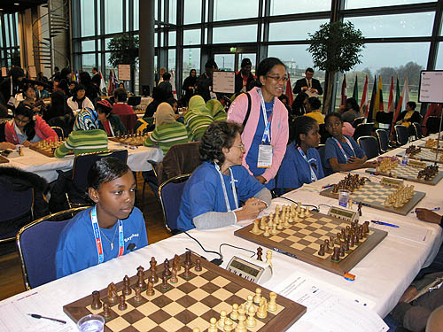 Amon Simutowe of Zambia questioning the forfeit of Surinames Roger Matoewi (far right) who was seconds late. The arbiter stood firm on the policy.