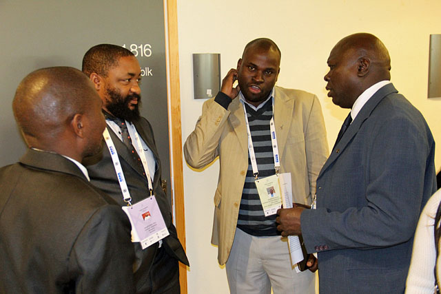African delegates conferring during a coffee break.
